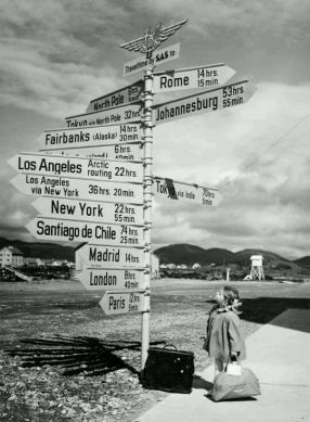 travel-sign-post-with-litle-girl